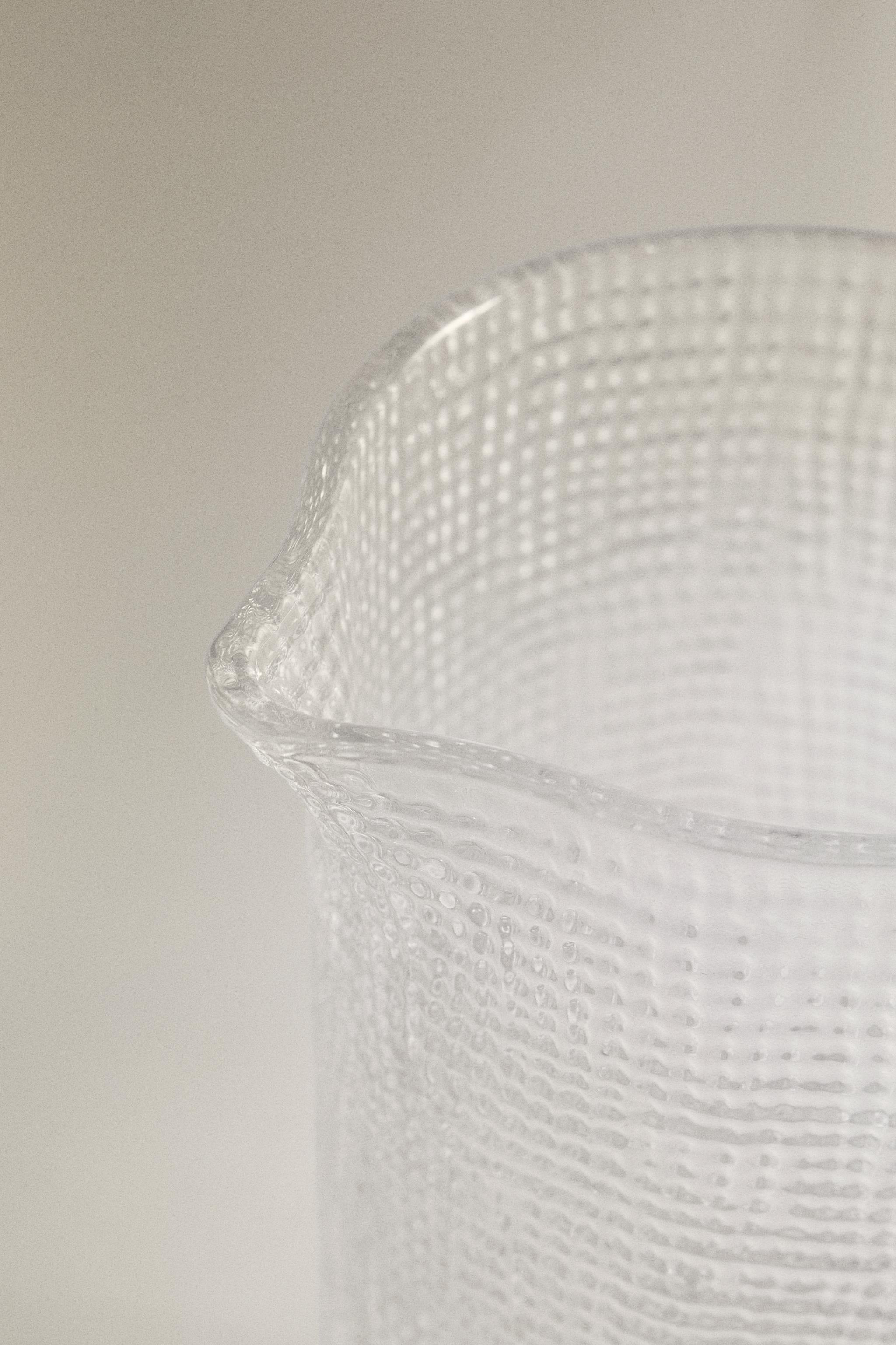 RAISED DESIGN GLASS PITCHER